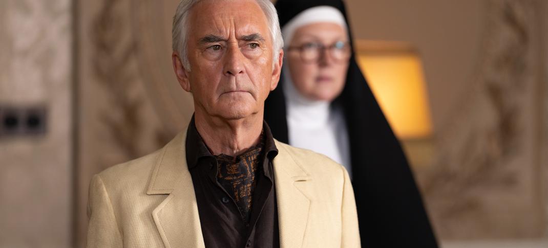 Denis Lawson as Lincoln Leigh Varsey doesn't know Lorna Watson as Sister Boniface lurks behind him in the Sister Boniface Mysteries Season 3