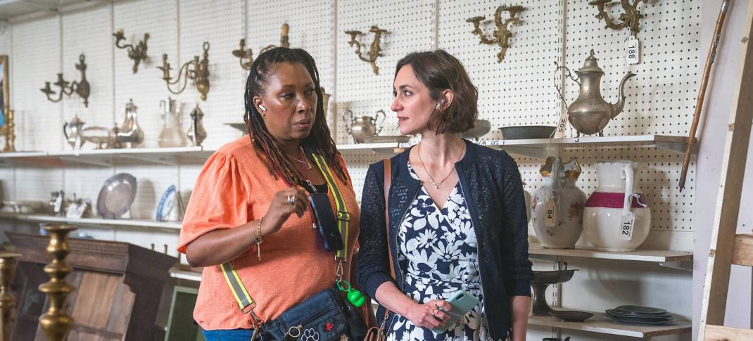 Jo Martin as Suzie Harris and Cara Horgan as Becks Starling in an antiques shop in 'The Marlow Murder Club' Season 1