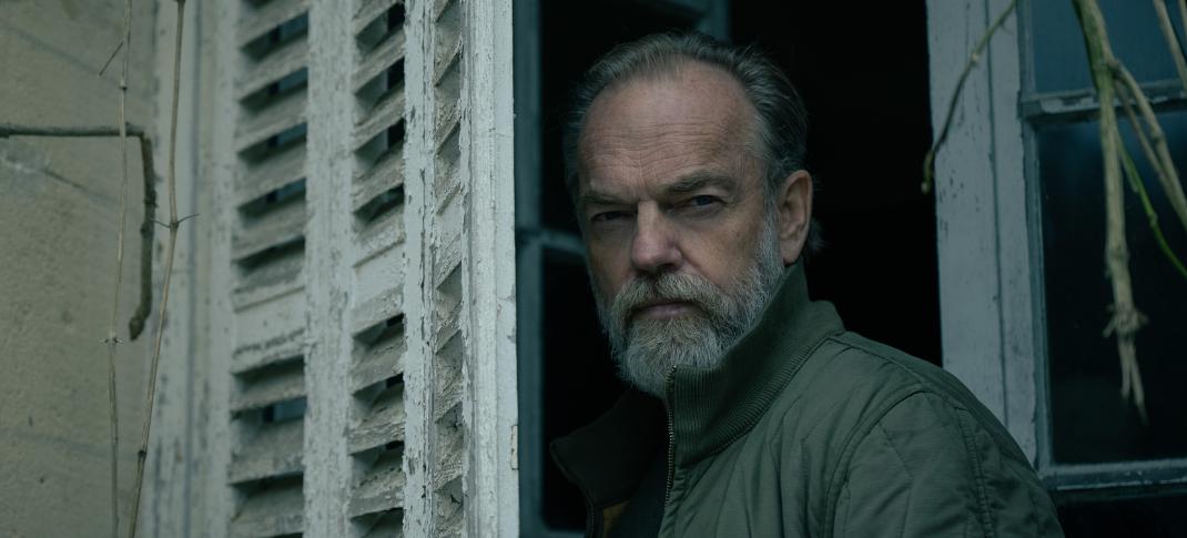 Hugo Weaving looking paranoid in Slow Horses Season 4