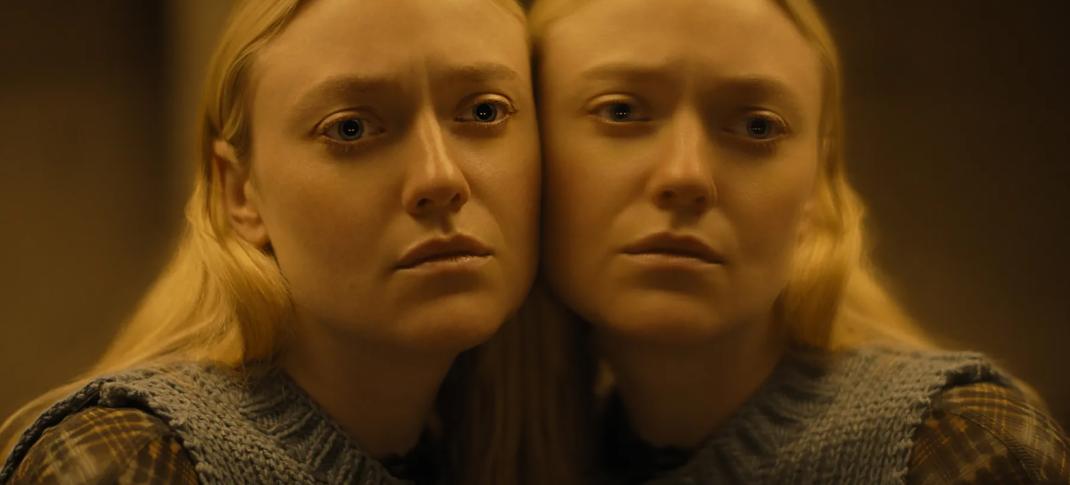 Dakota Fanning as Mina pressed against her reflection in The Watchers