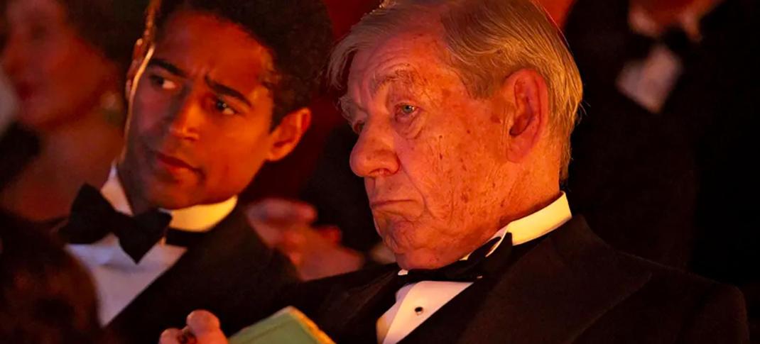  Alfred Enoch as Tom Turner and Ian McKellen as Jimmy Erskine critically watching a play in 'The Critic'