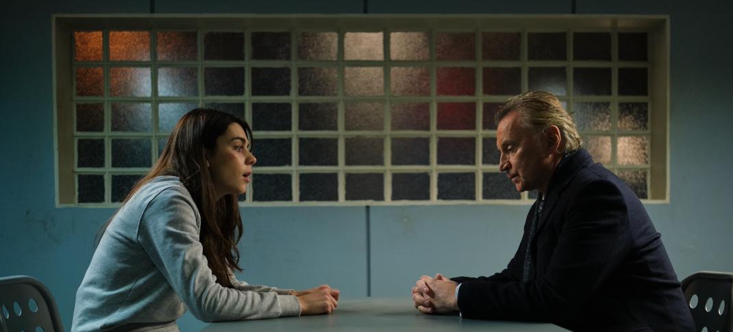 Picture shows: Ellie Sutherland (Holly Cattle) and her father Robert Sutherland (Robert Carlyle) talk in a police interview room.