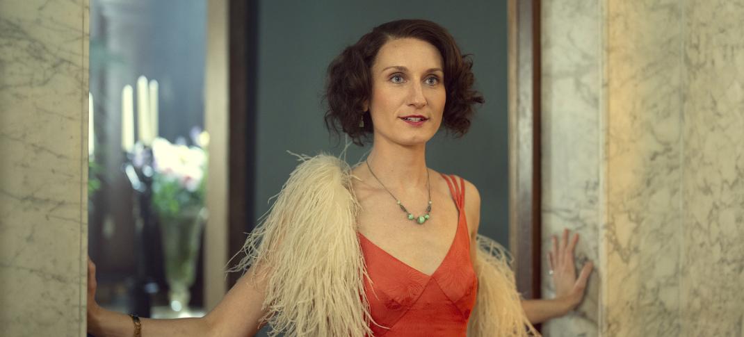 Bessie Carter as Nancy Mitford in "Outrageous"