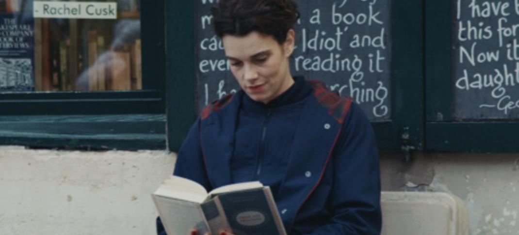 Camille Rutherford as Agathe, happily ruining her life by reading Jane Austen in 'Jane Austen Wrecked My Life'