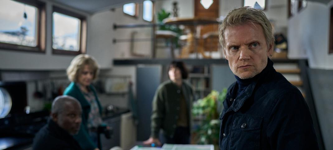 Dennis Rudge as Marcus, Raquel Cassidy as Anki, Maimie McCoy as Lucienne, and Marc Warren as Piet Van der Valk in 'Van der Valk' Season 4