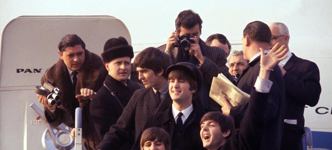 John Lennon, Paul McCartney, George Harrison, Ringo Starr, and George Martin arrive in America in 'Beatles 64'