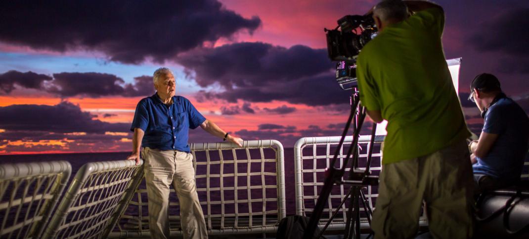 Sir David Attenborough filming aboard the research vessel Alucia in 2015 for 'David Attenborough’s Great Barrier Reef'