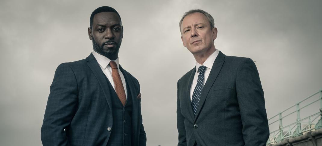 John Simm as DI Roy Grace and Richie Campbell as DS Glenn Branson in 'Grace' Season 5