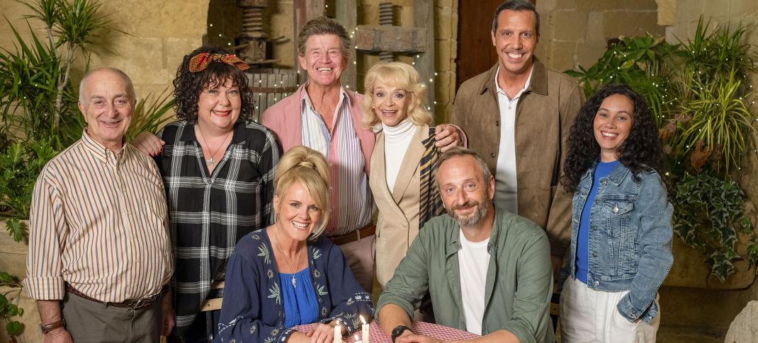 Tony Robinson as Uncle Patrick, Sue Vincent as Gloria Beauchamp, Sally Lindsay as Jean White, Robin Askwith and Sue Holderness as Jeremy and Judith Lloyd James, Steve Edge as Dom Hayes, Alex Gaumond as Caron, and Jacqueline Berces as Gendarme Richard in 'The Madame Blanc Mysteries' Season 4