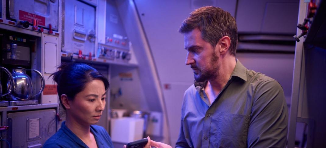 Richard Armitage and Jin Lusi in "Red Eye"