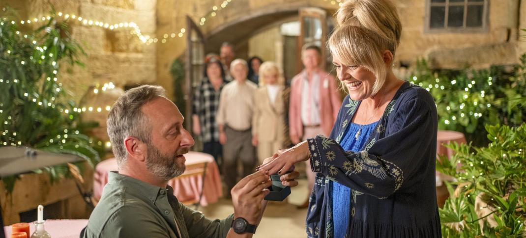 Picture shows: Dom (Steve Edge) proposes to Jean (Sally Lindsay) cheered on by their friends.