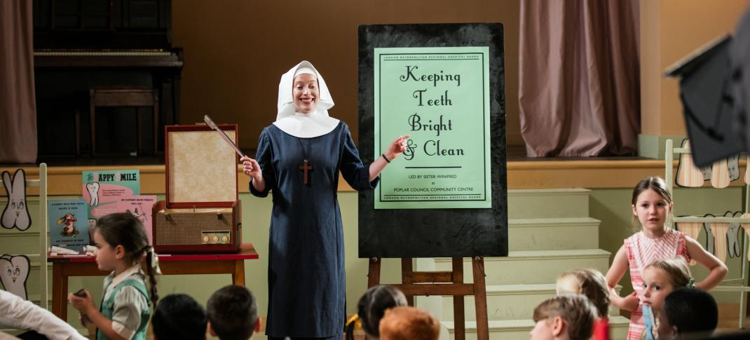 Sister Winifred (Victoria Yeates) teaches dental health.  (Photo: Courtesy of Neal Street Productions 2016)
