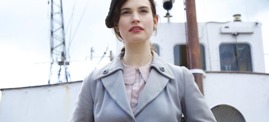 Downton Abbey’s Lily James stars as Juliet Ashton in ‘The Guernsey Literary and Potato Peel Pie Society’. (Photo courtesy of Studiocanal ©2017)