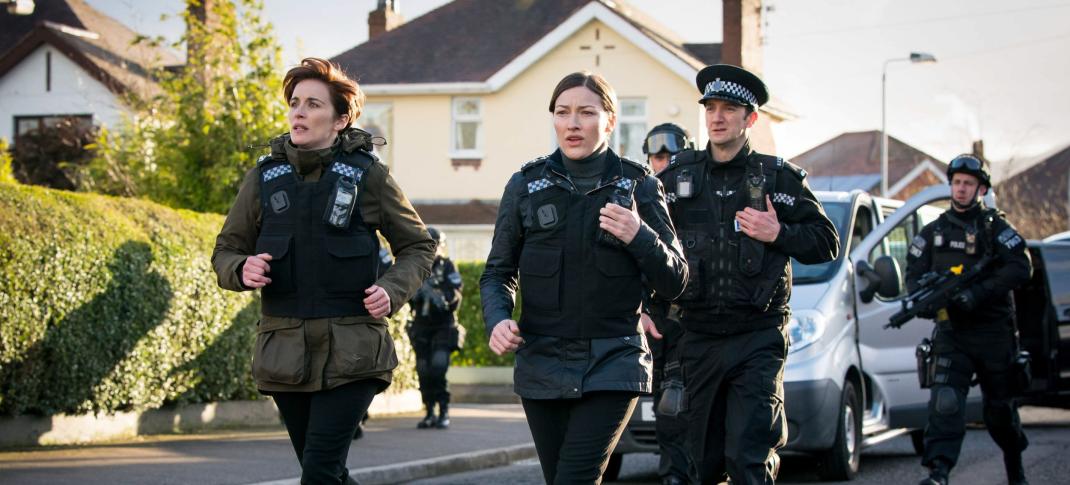 Vicky McClure as Kate Fleming and Kelly MacDonald as DCI Jo Davidson hurry to the stakeout in 'Line of Duty' Season 6