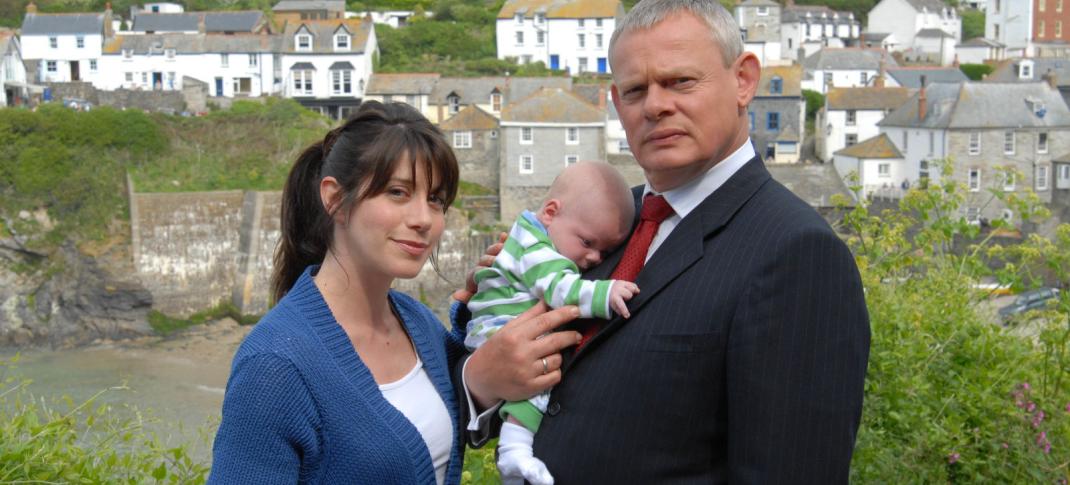 Caroline Catz as Louisa and Martin Clunes as Doc Martin with Baby James in 'Doc Martin' Season 6