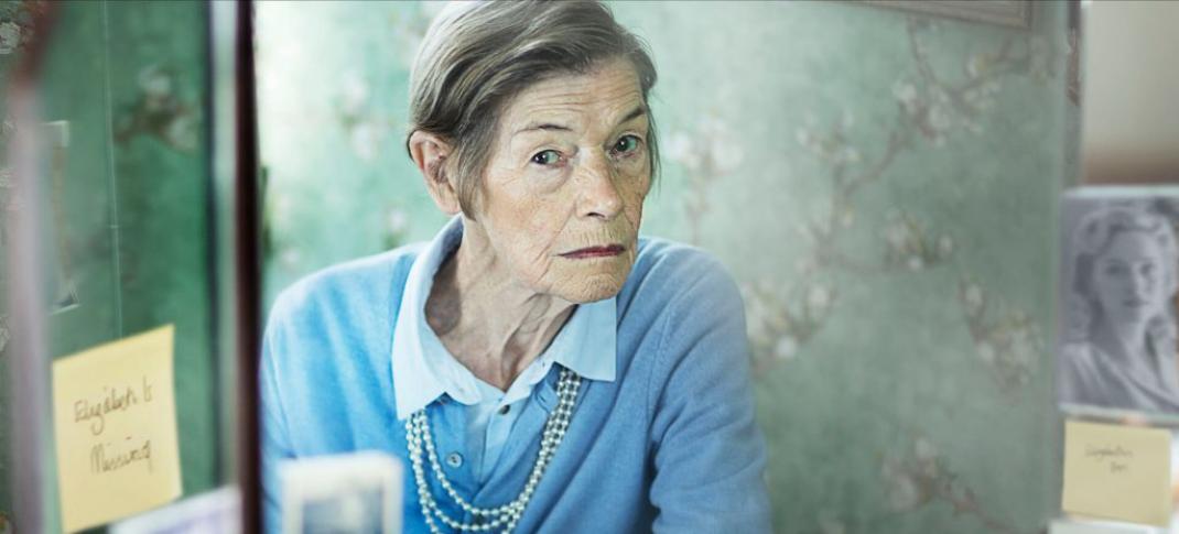 Glenda Jackson looking at herself in the mirror in Elizabeth Is Missing