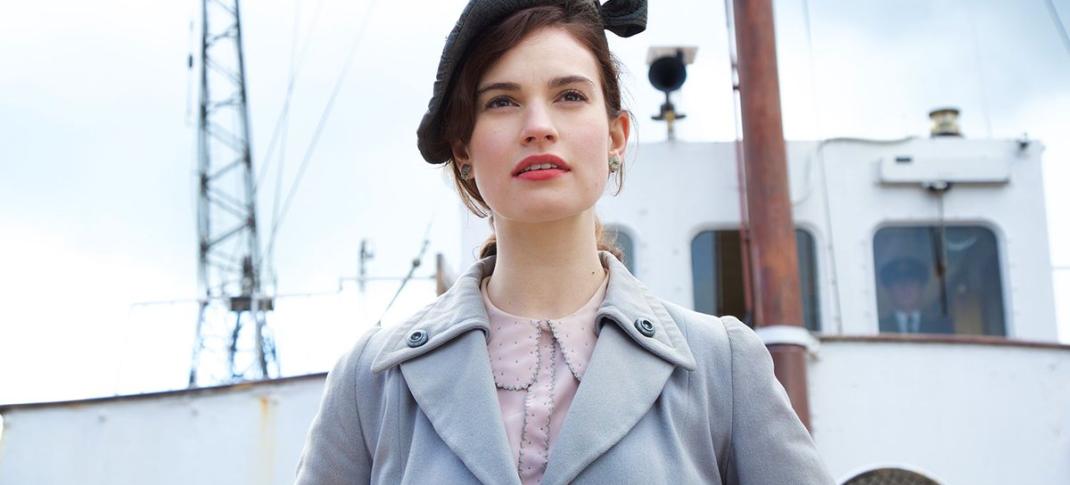 Downton Abbey’s Lily James stars as Juliet Ashton in ‘The Guernsey Literary and Potato Peel Pie Society’. (Photo courtesy of Studiocanal ©2017)