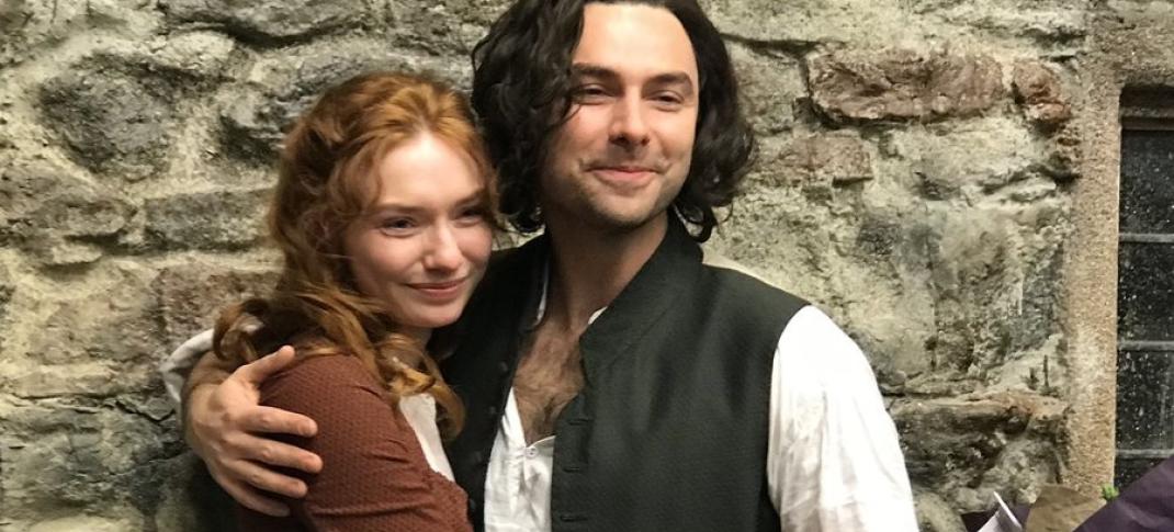 Aidan Turner and Eleanor Tomlinson celebrate the end of an era. (Image via BBC)