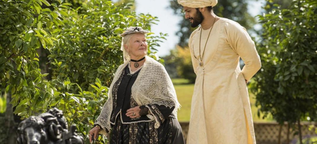 Dame Judi Dench and Ali Fazal star in Victoria and Abdul, the biographical drama showcasing the unexpected friendship of the Queen and her Indian servant. (Image courtesy of Focus Features © 2017)